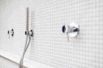 Close up modern, minimalist home showcase shower faucet — Stock Photo