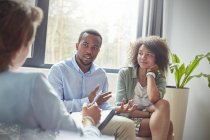 Couple talking to therapist in couples therapy session — Stock Photo