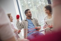 Group therapy session doing team building exercise with yarn — Stock Photo