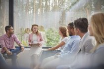 Therapist leading group therapy session — Stock Photo