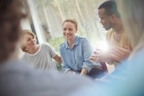 People clapping for woman in group therapy session — Stock Photo