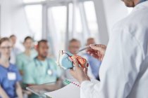 Surgeon leading conference at medical hall — Stock Photo