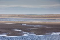 Baía de areia tranquila, Morecambe Bay, Reino Unido — Fotografia de Stock