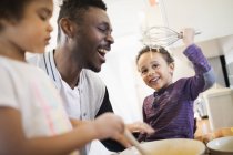 Father and toddler children baking in kitchen — Stock Photo