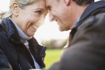 Mature caucasian couple looking at each other — Stock Photo