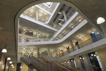Modern office lobby atrium with balconies — Stock Photo