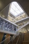 Modern office atrium interior with skylight — Stock Photo