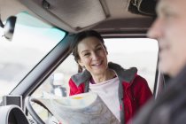 Couple with map, in motor home — Stock Photo