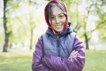 Portrait smiling, confident active senior woman in park — Stock Photo