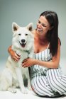 Portrait happy woman with dog — Stock Photo