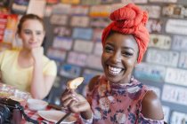 Portrait enthusiastic young woman in restaurant — Stock Photo