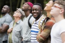 Portrait smiling, confident man hiking with friends — Stock Photo