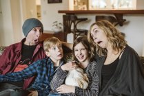 Playful, silly family making faces — Stock Photo