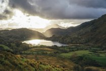 Scenic, remote sunset landscape and lake view, Snowdonia NP, UK — Stock Photo