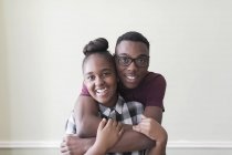 Portrait affectionate teenage brother and sister — Stock Photo