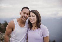 Portrait happy couple hiking — Stock Photo