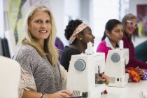 Portrait confident women taking sewing class — Stock Photo