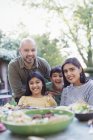 Portrait happy family at dinner table — Stock Photo
