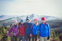 Portrait of happy family mountain hiking — Stock Photo