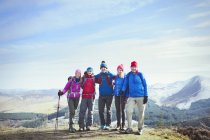 Family hiking on mountaintop — Stock Photo