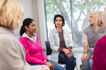 Women's support group talking in circle — Stock Photo