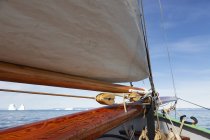 Wooden sailboat mast on sunny arctic ocean Atlantic Ocean Greenland — Stock Photo