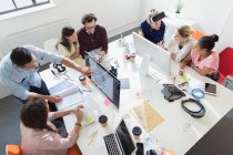 Designers working in open plan office — Stock Photo