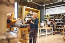 Senior women shopping for bakeware in home goods store — Stock Photo