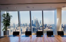 Scenic cityscape view from modern highrise conference room, London, UK — Stock Photo