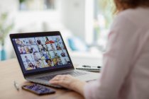 Colleagues video conferencing on laptop screen — Stock Photo