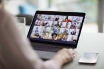 Colleagues video conferencing on laptop screen — Stock Photo