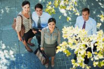 Smiling business people outdoors — Stock Photo