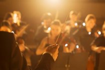 View of  Conductor leading orchestra — Stock Photo