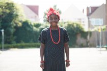 Portrait confident boy in traditional African clothing — Stock Photo