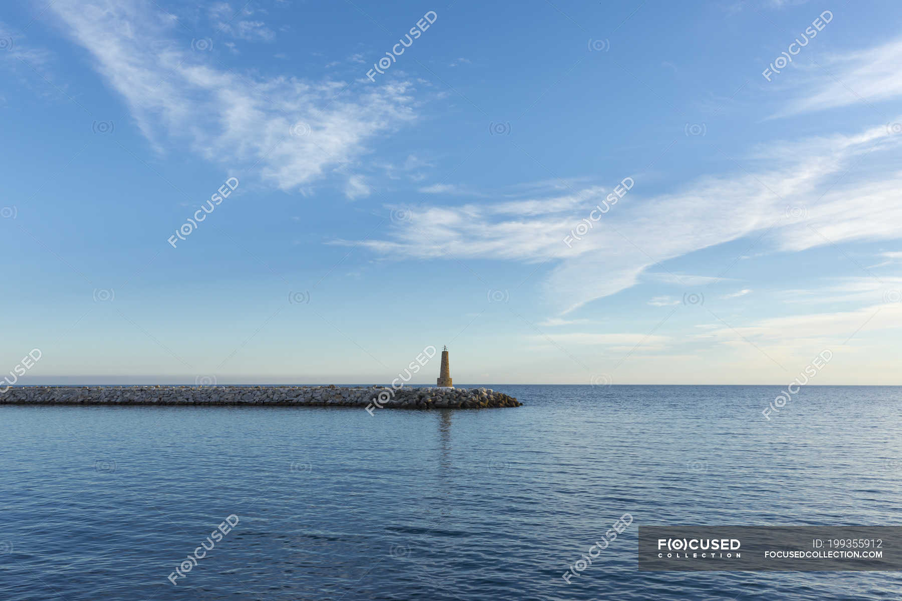 Lighthouse on jetty during daytime — ocean, sea - Stock Photo | #199355912