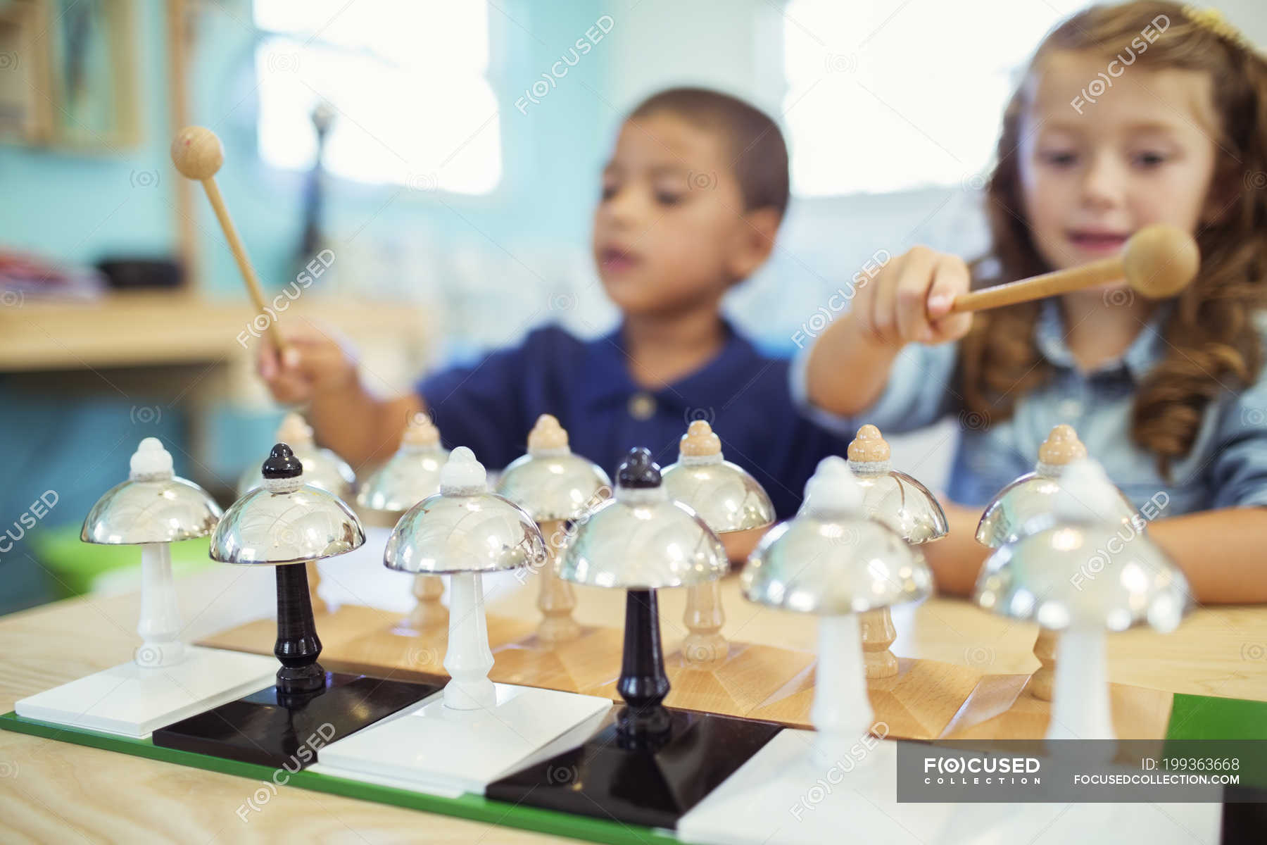 Students playing bells in class — Front View, melody - Stock Photo ...