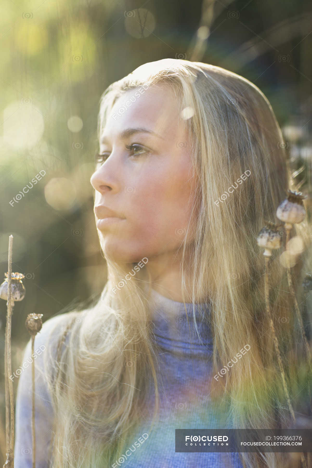 Pensive Beautiful Blonde Teenage Girl Looking Away Outdoors One