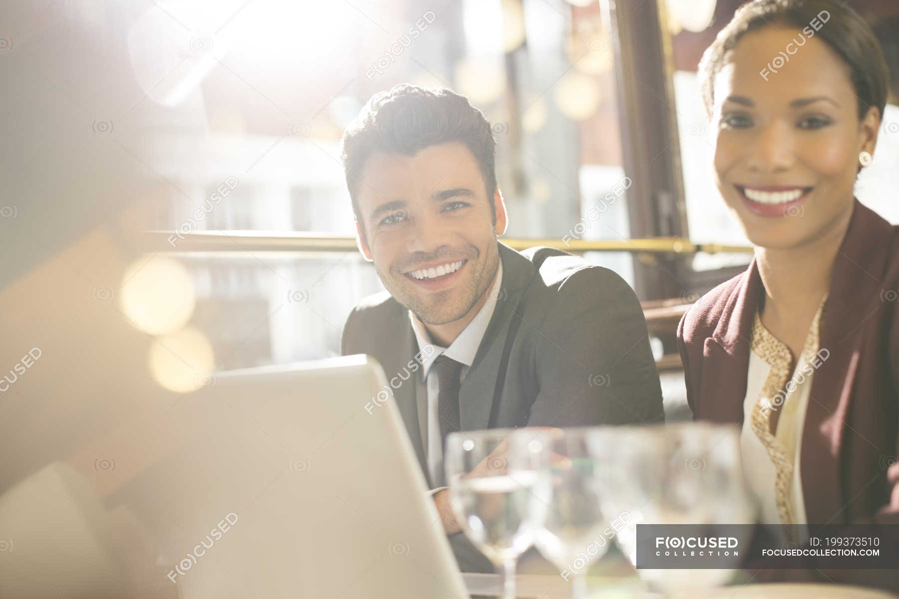 Young business people smiling in restaurant — portrait, meeting - Stock ...