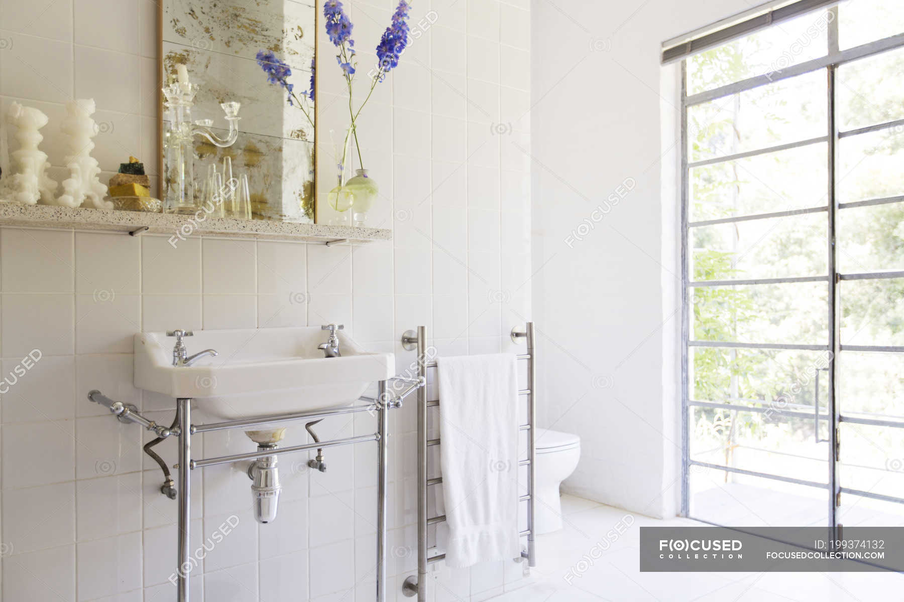 Sink And Towel Rack In Rustic Bathroom Basin