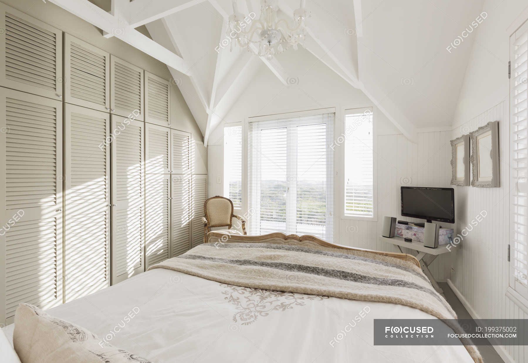 Tranquil Sunny White Bedroom With Vaulted Ceiling Home Interior