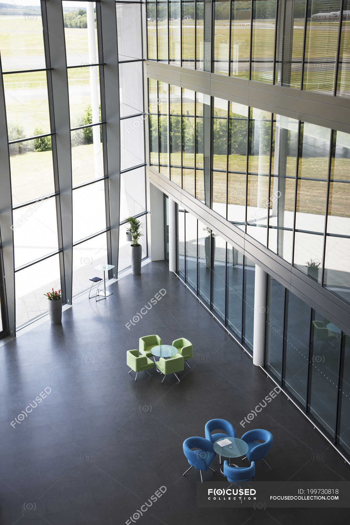 Chairs and table in office lobby area — photography, estate Stock Photo 199730818