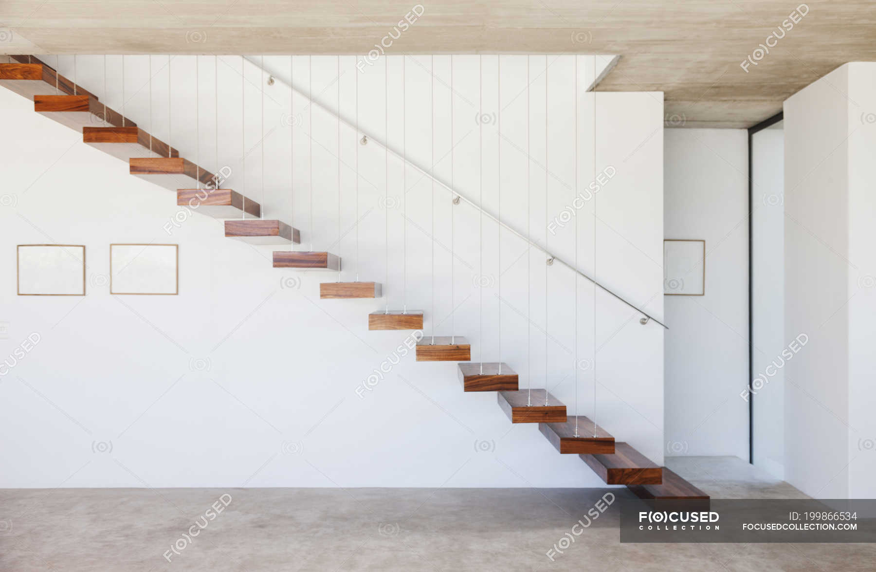 focused 199866534 stock photo side view floating staircase modern