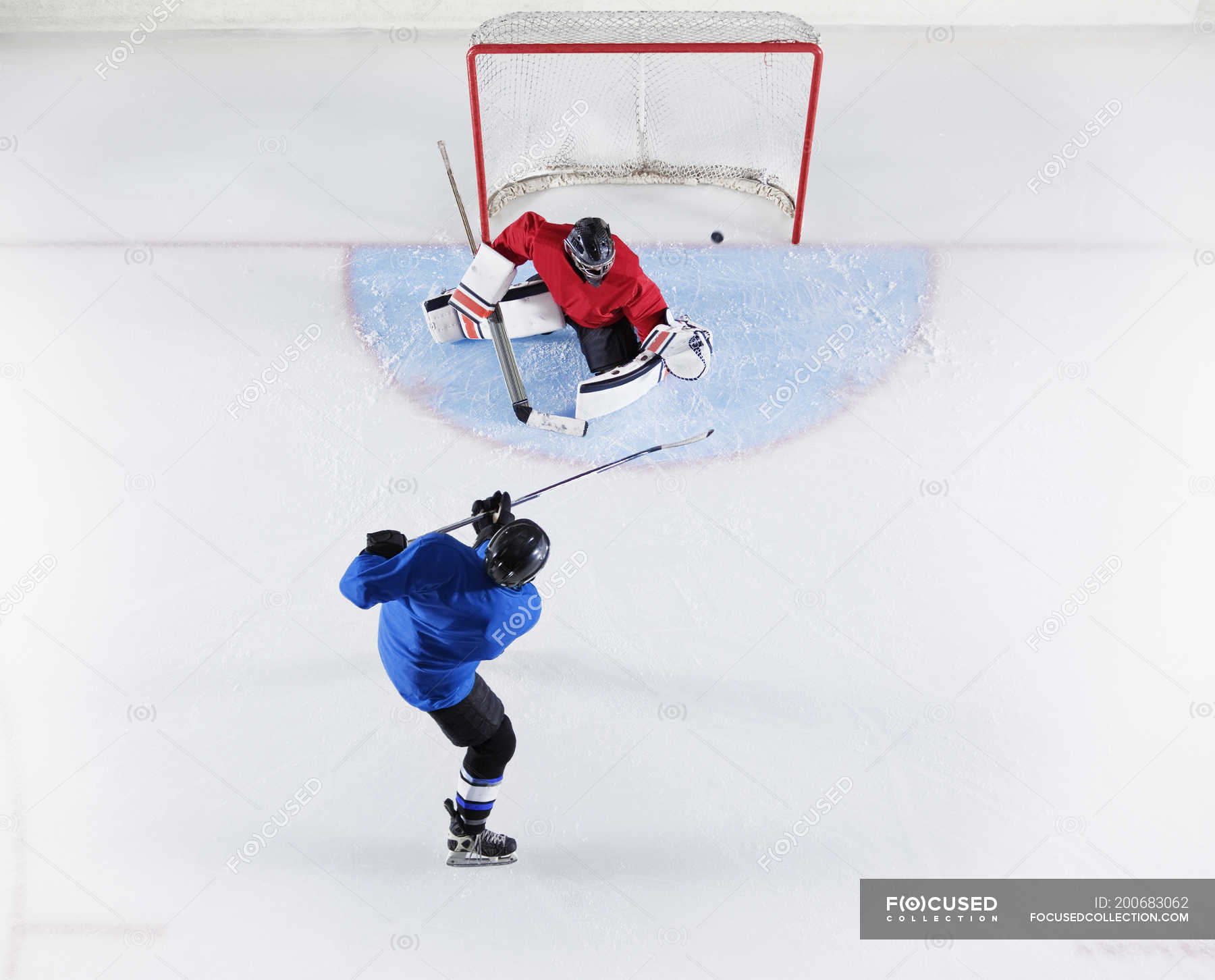 Hockey player scoring a goal 