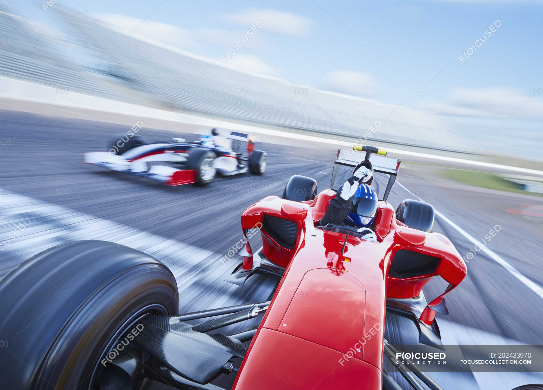 Formula one race car crossing finish line on sports track — F1 grand
