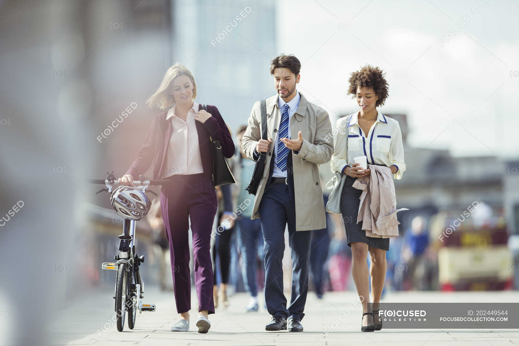business people walking in the city