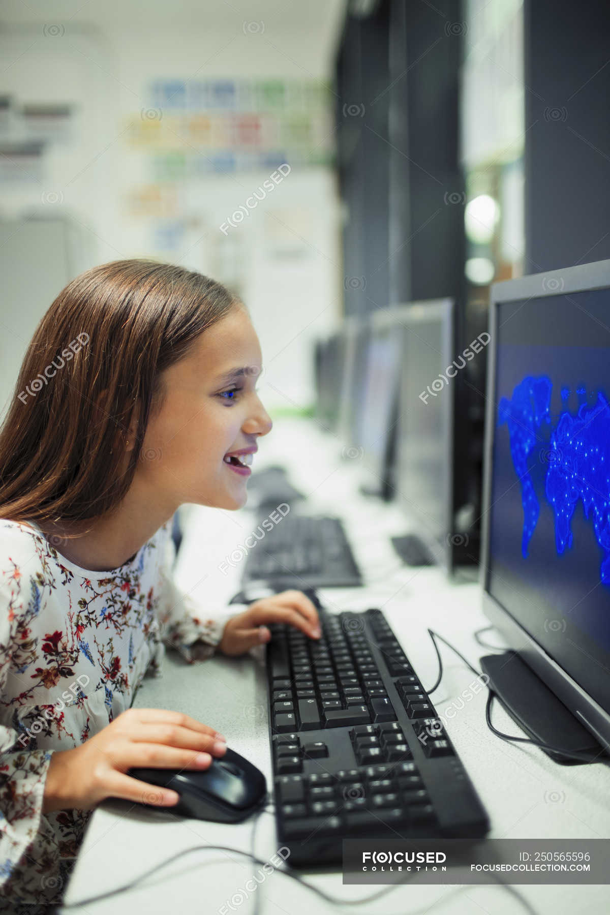 Junior high school girl student using computer in classroom — secondary  school, indoors - Stock Photo | #250565596