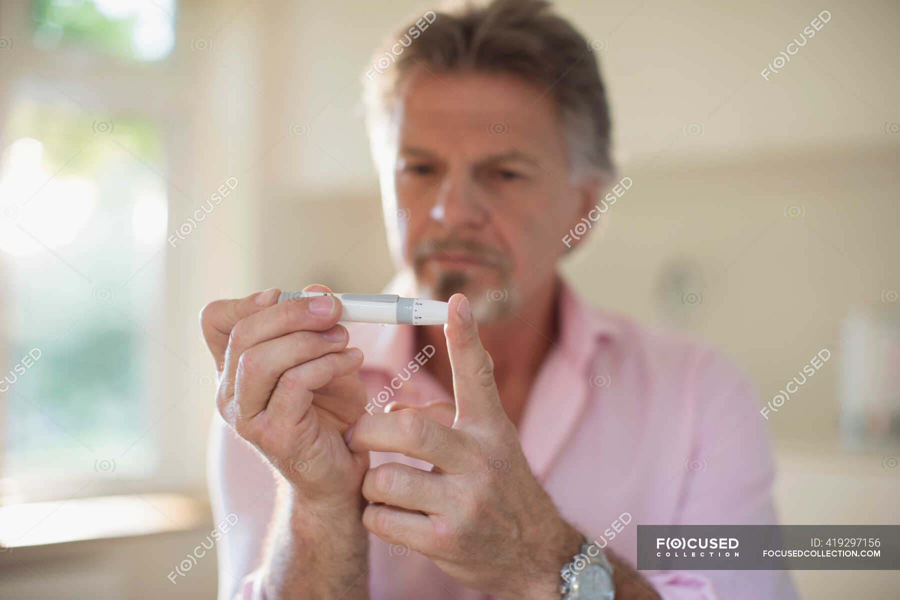 glucose-meter-stock-photos-royalty-free-images-focused