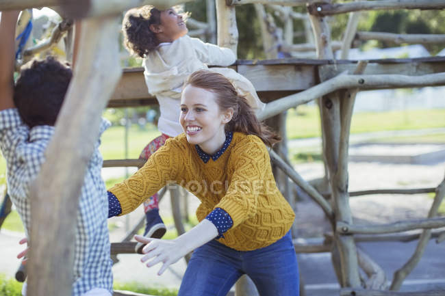 Student and teacher playing outdoors — Stock Photo