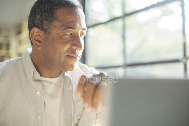 Close up of senior man at laptop — Stock Photo
