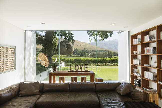 Living room overlooking garden — Stock Photo